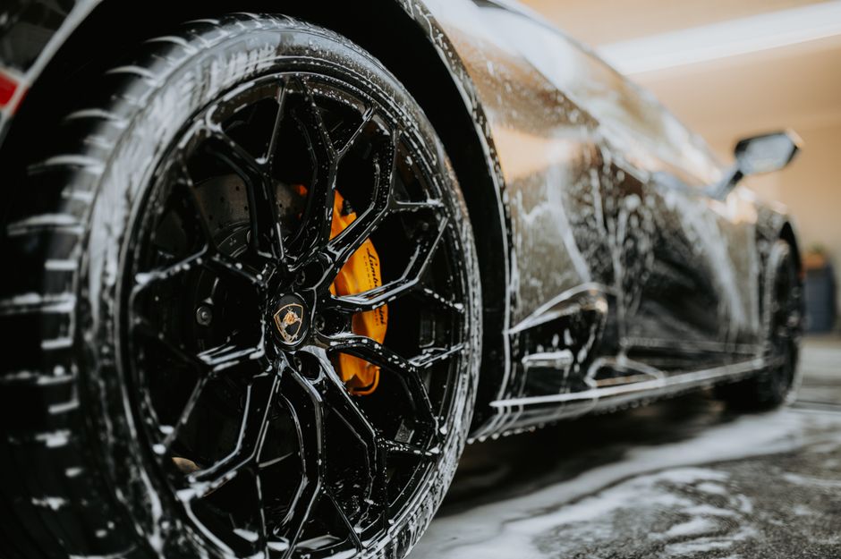 Luxury car receiving a premium car wash